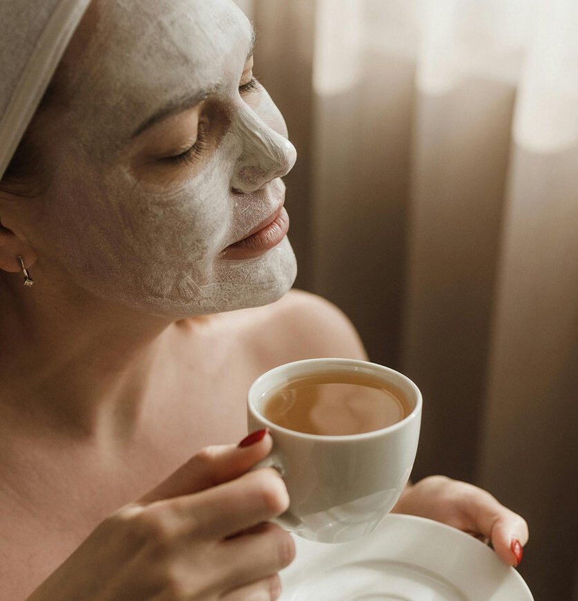 young-woman-having-face-massage-relaxing-spa-salon 1